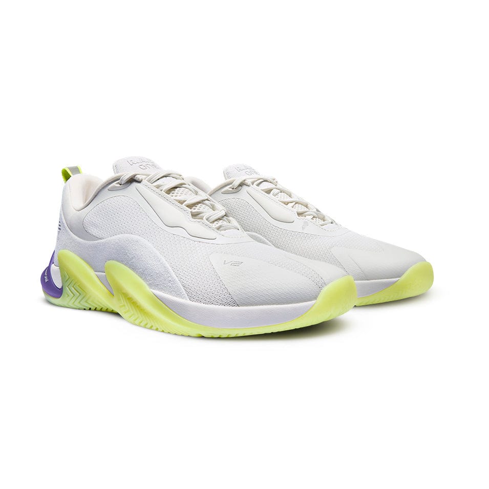 White athletic shoes with neon green and purple accents.