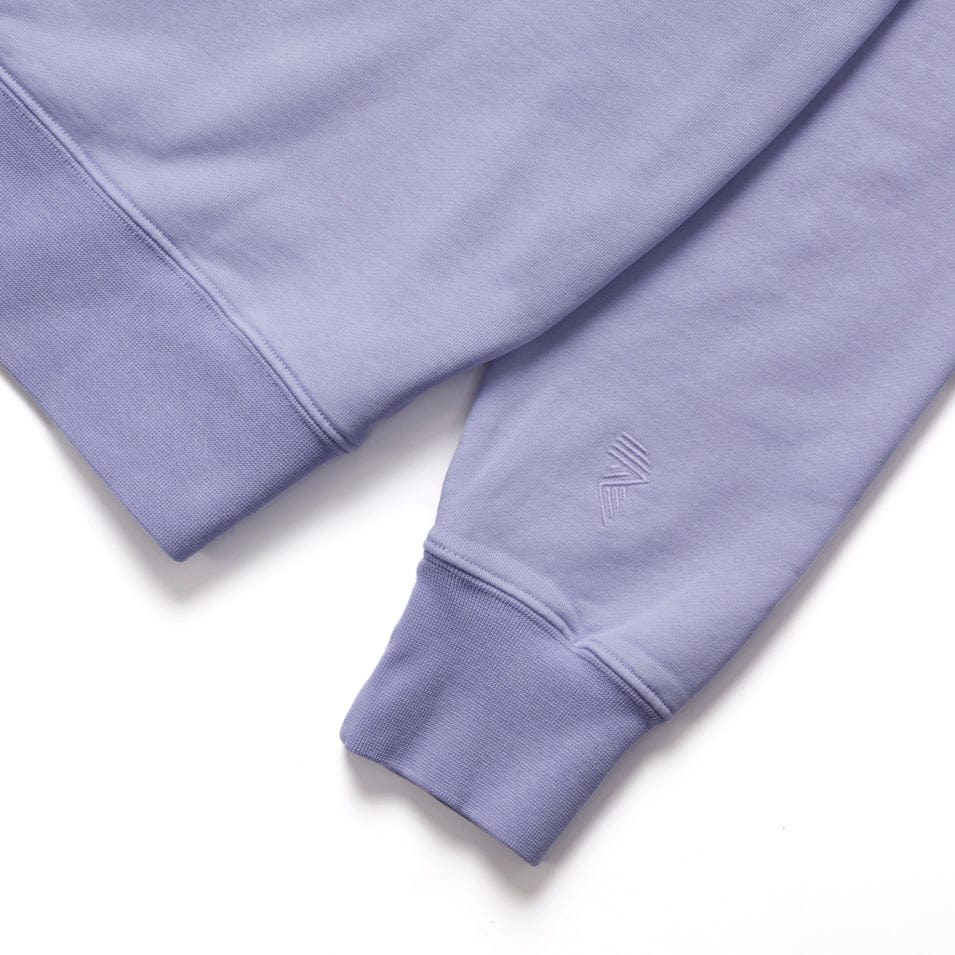 Lavender sweatshirt sleeve.