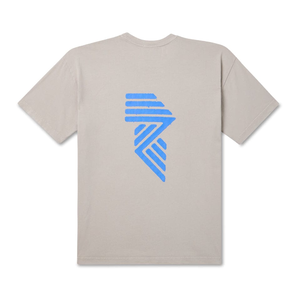 Beige t-shirt with blue geometric design.