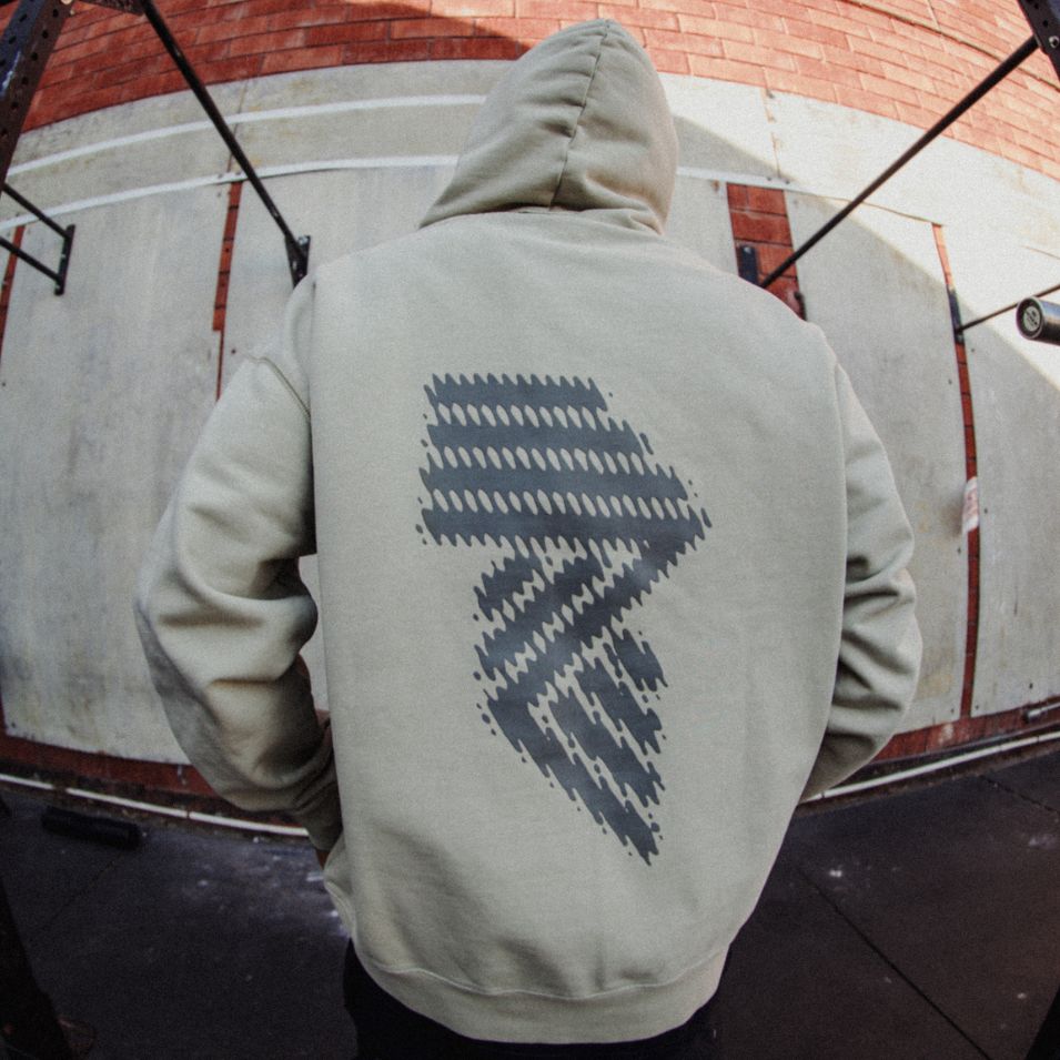 Hooded sweatshirt with patterned graphic.