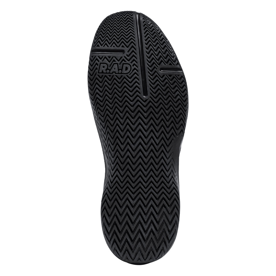 Black shoe sole with chevron pattern.