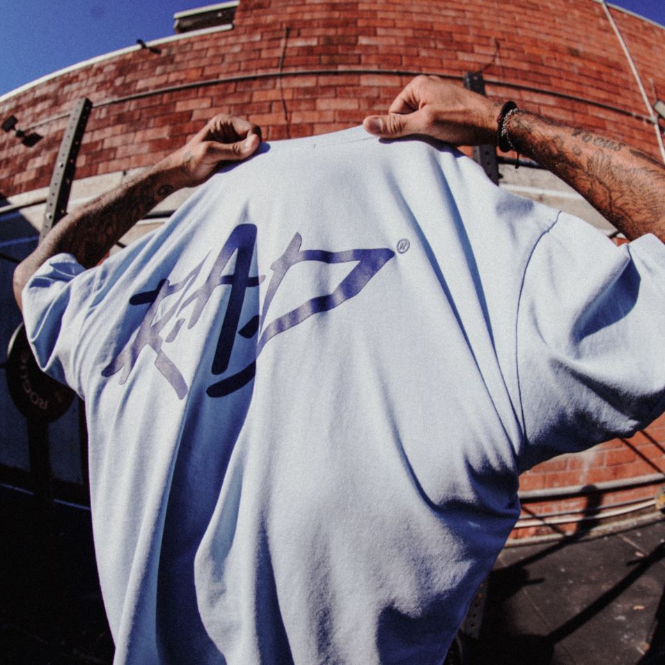 Light blue t-shirt.