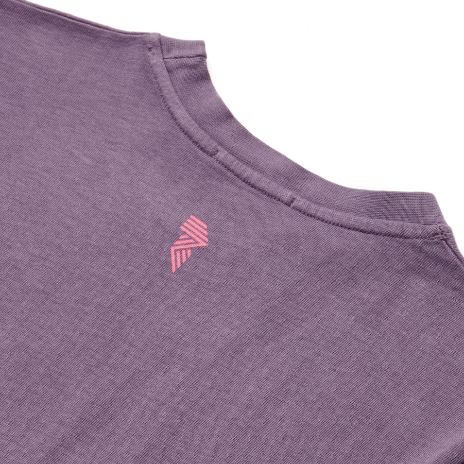 Purple t-shirt with pink logo.