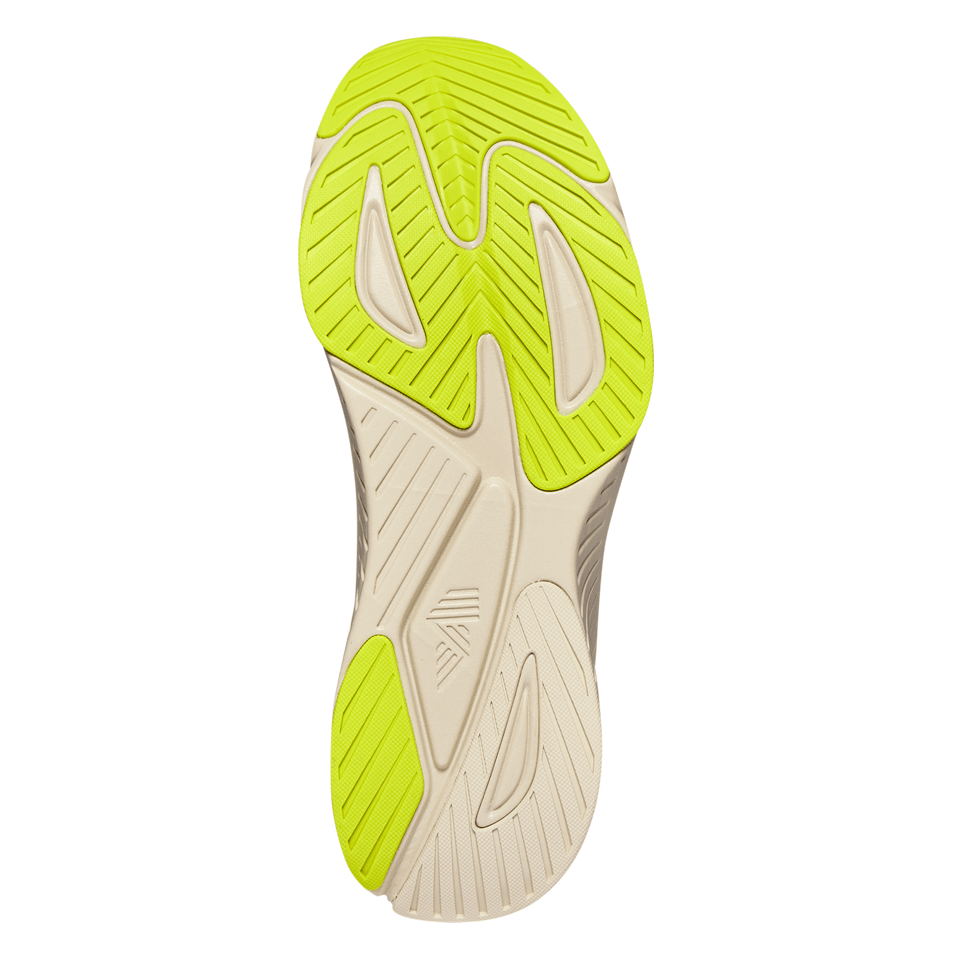 Shoe sole with yellow and beige tread.